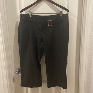 Loose fit, Black Crop pants with built in belt and sewn hem. Slight pinstripe
